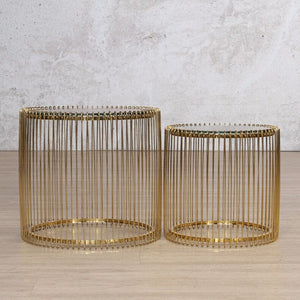 The Antilia Coffee Table Set is a stunning blend of luxury and practicality. Featuring a gold stainless steel base and sleek mirror tops, this nesting coffee table set is perfect for modern living spaces, adding glamour and versatility to your home.