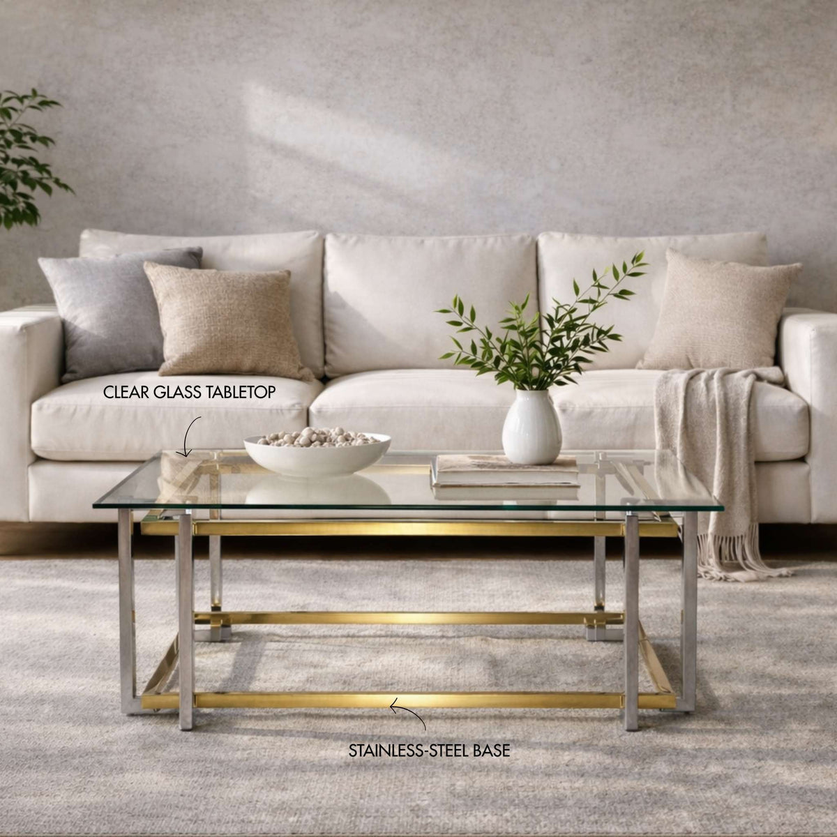 Leather Gallery Arabella Coffee Table, featuring a glass top with a gold base in a modern living room.