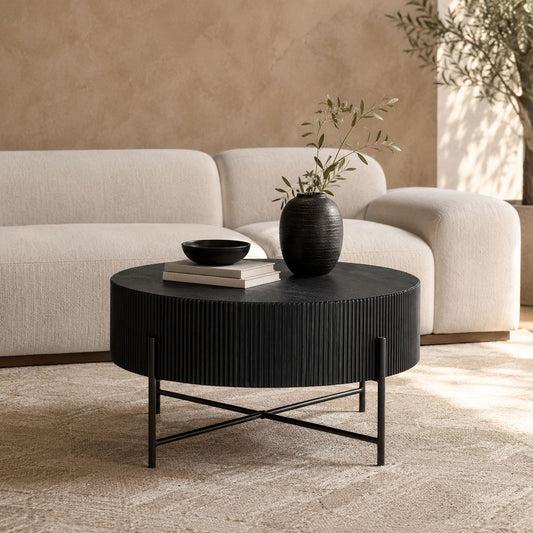 Armstrong black coffee table with X-frame metal legs styled in a modern living room. | coffee tables, round coffee table, wood coffee table 
