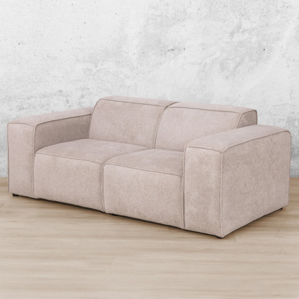 Angle view of Austin 2 Seater Fabric Couch in Belle Beige | Fabric Couches, 2 seater couch, beige couch, luxury couches