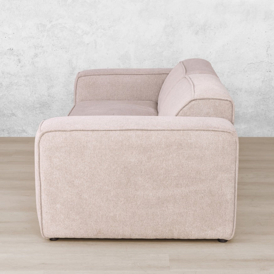 Side view of Austin Fabric 3-seater Couch in Belle Beige showing plush, firm backrests. | Fabric couches, luxury couches, beige couches