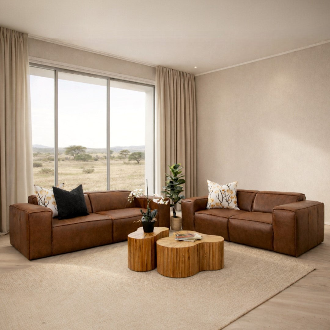 Austin 3+ 2 Leather Couch Suite in Woodlands Spice, in a bright, modern-minimalist styled living room. Genuine leather couches. 