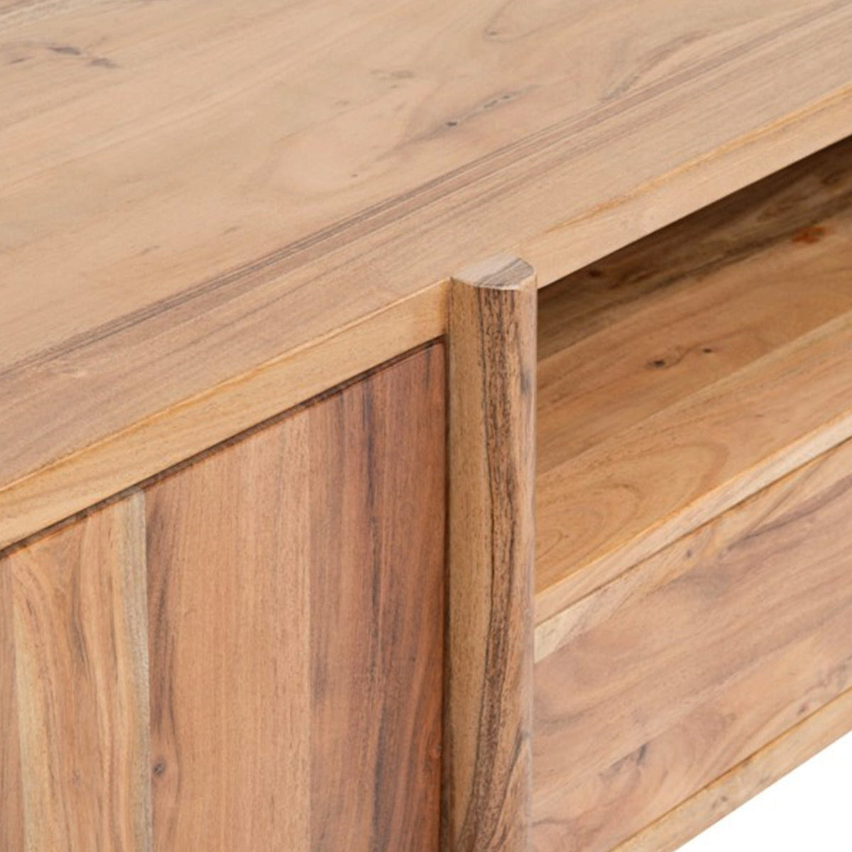 Detailed view of the top surface and rounded corner pillar of the Baltic natural wood media unit.