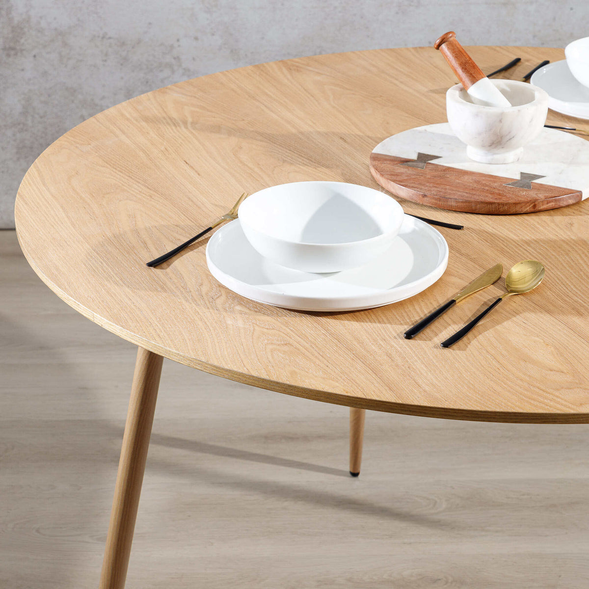 Beckett dining table styled with dinnerware showing tabletop scale and proportion. | wood dining room table, dining room furniture