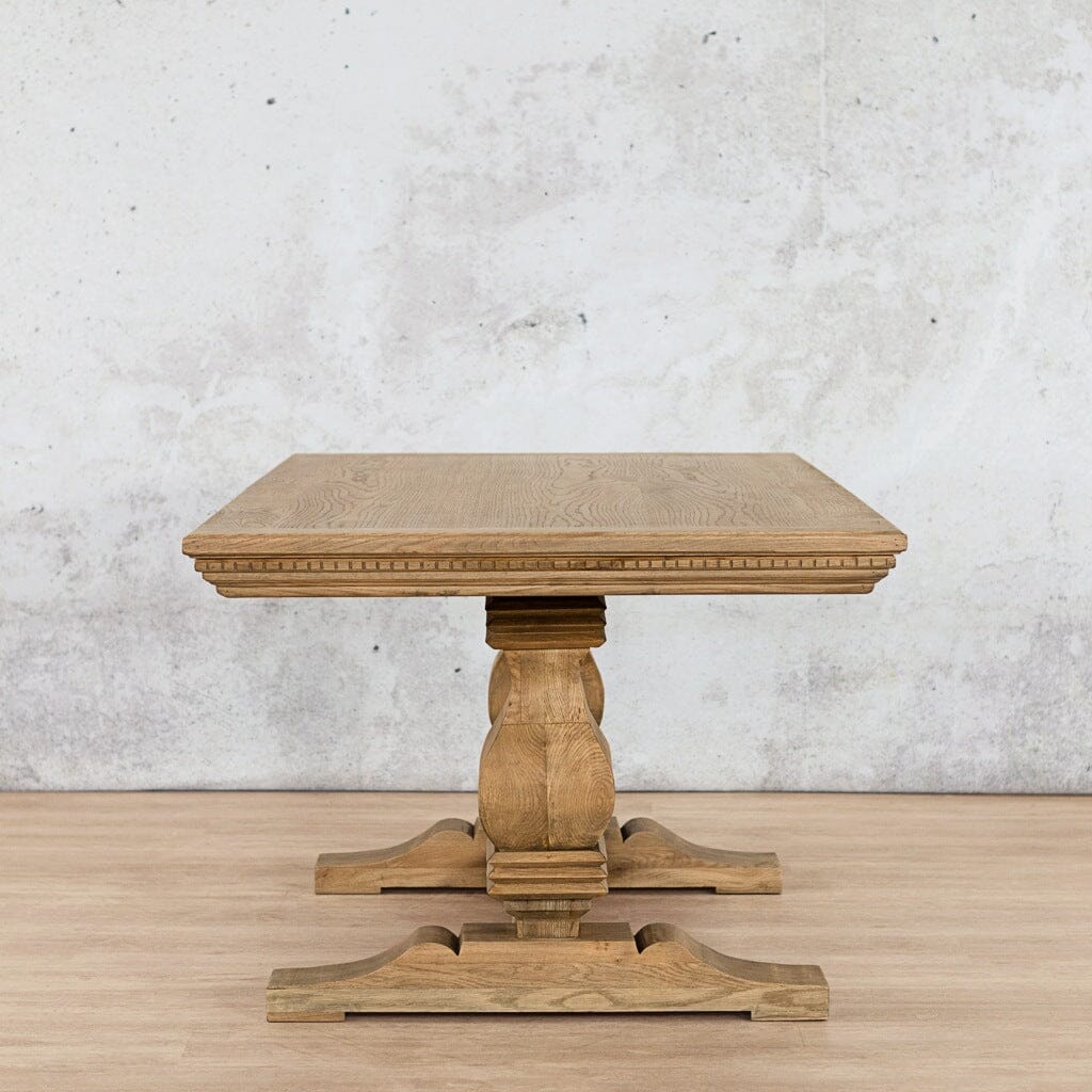 Belmont 10 seater wooden dining table paired with upholstered chairs in a modern dining room setting-antique-natural-oak