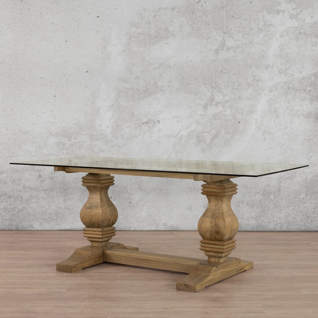 Angled view of the Belmont 8-10 seater Glass Top Dining Table – in Antique Natural Oak, highlighting the sturdy base and elegant glass top, perfect for large gatherings | Leather Gallery-antique-natural-oak