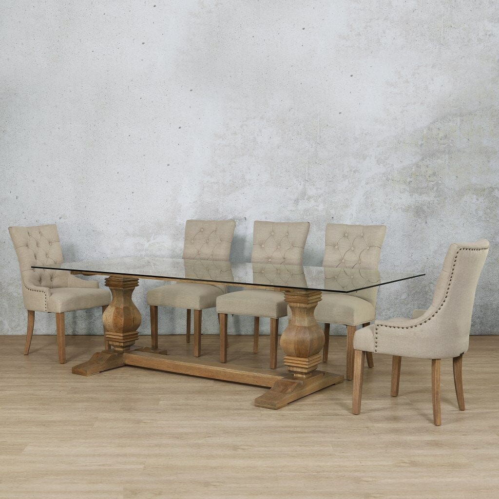 Close-up of the Belmont glass dining room table and chairs with wooden accents. 
