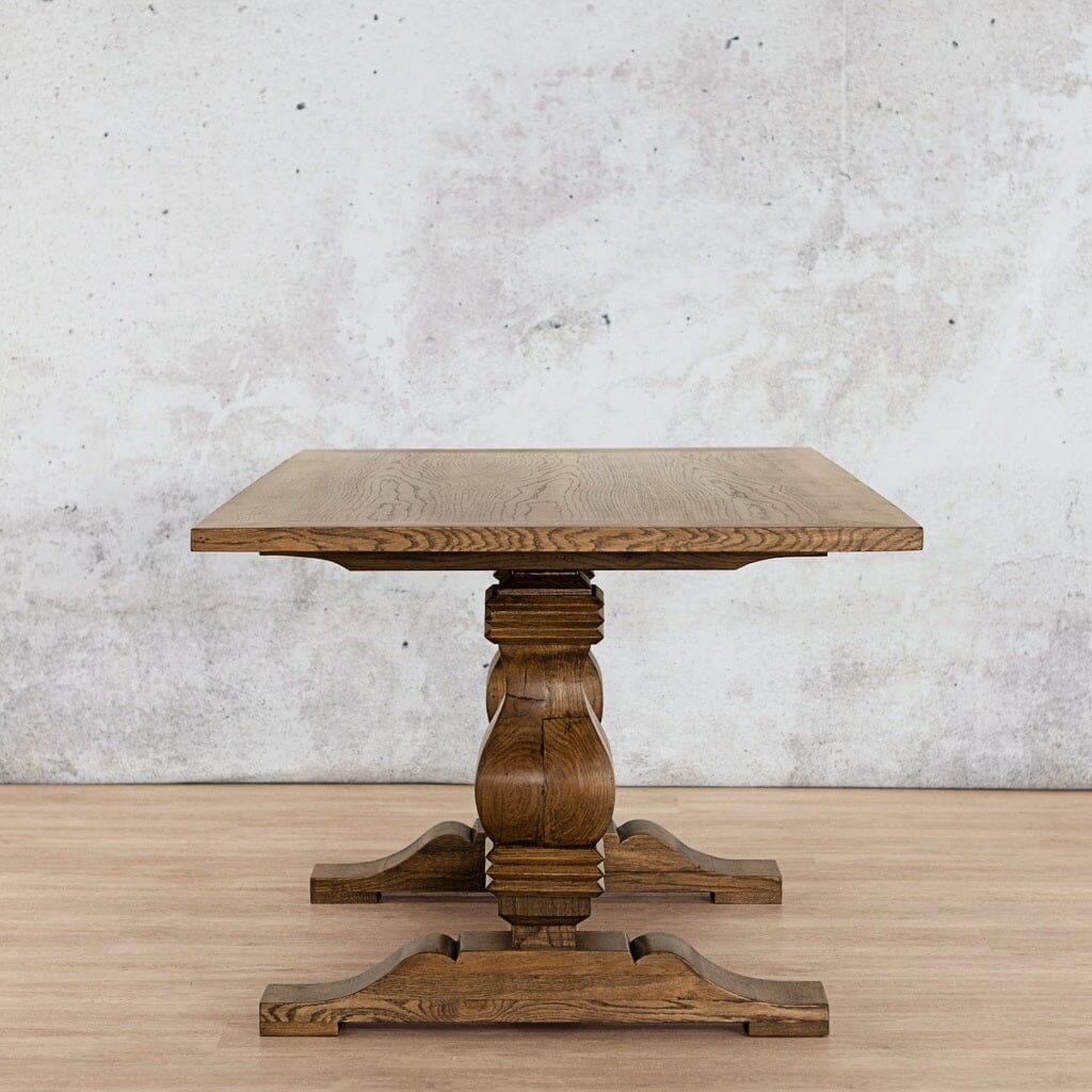 Side view of the Belmont Wood Top Dining Table – 6 Seater in Antique Dark Oak, highlighting the sleek design and wood finish that complements any dining space. Leather Gallery-antique-dark-oak