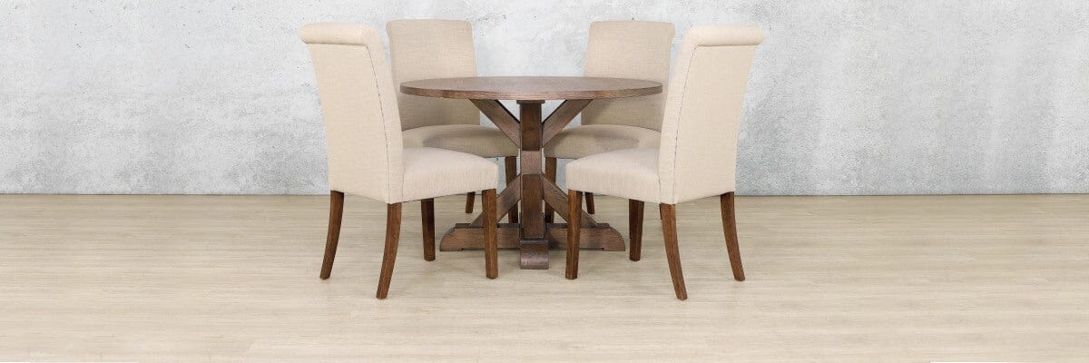 4 seater dining room set featuring the Berkeley Round Table with Oakwood finish and Duchess chairs