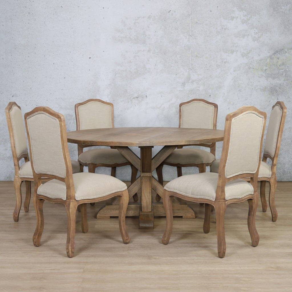 Stylish 4 seater round dining table set with a 1.2m Oakwood top and sculptural base, ideal for small dining areas with a classic touch.
