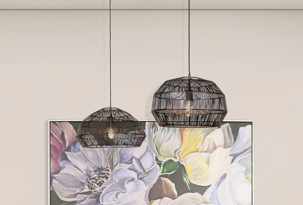 Add depth to your interiors with the warm glow of the Labyrinth Wire Pendant Light in bronze, available in large and small sizes.