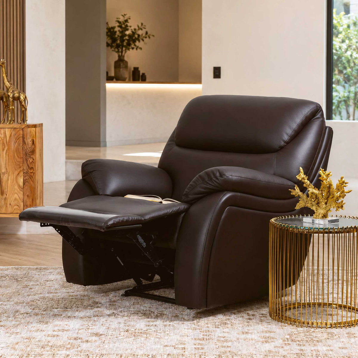The Cairo 1 seater black leather recliner chair offers timeless comfort with its plush leather upholstery and smooth manual reclining mechanism for ultimate relaxation.