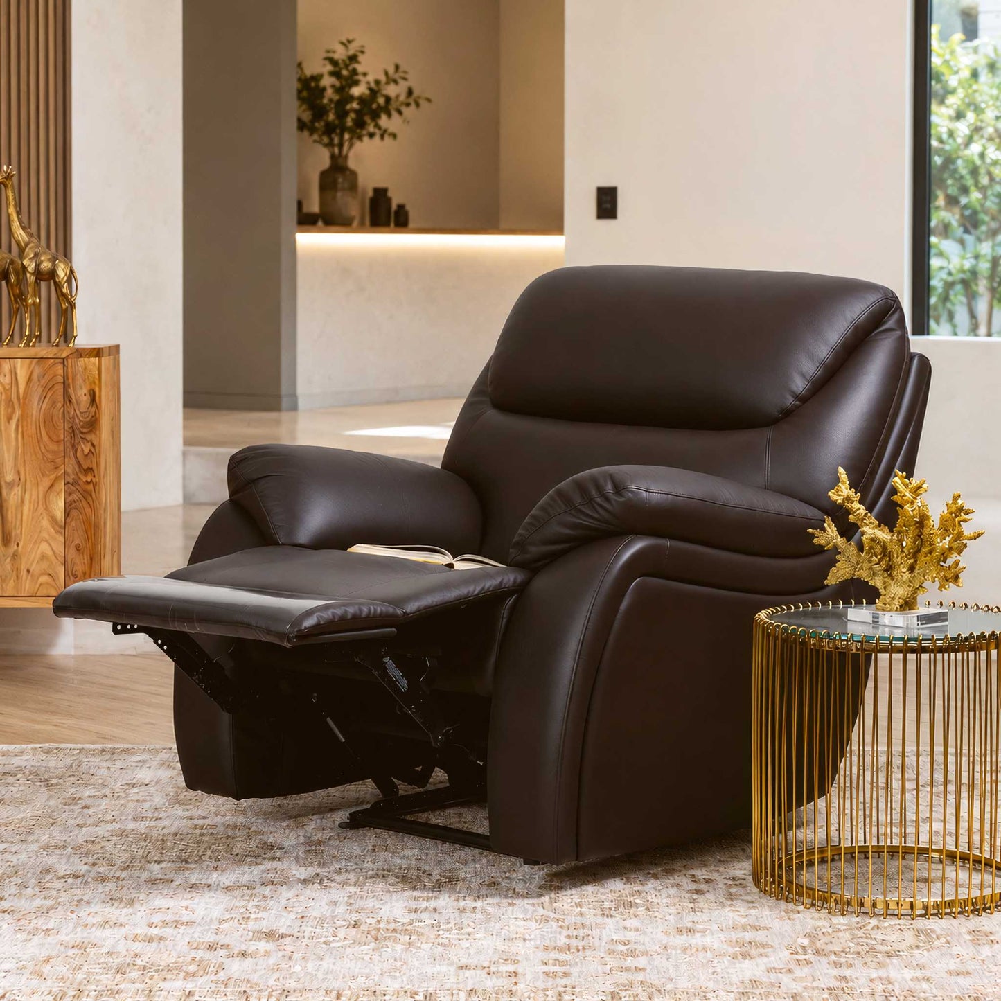 The Cairo 1 seater black leather recliner chair offers timeless comfort with its plush leather upholstery and smooth manual reclining mechanism for ultimate relaxation.