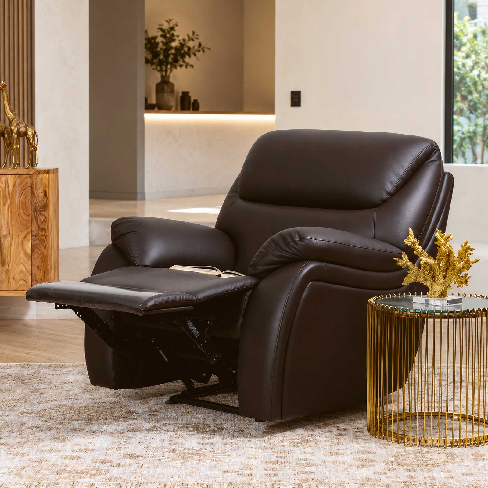 The Cairo 1 seater black leather recliner chair offers timeless comfort with its plush leather upholstery and smooth manual reclining mechanism for ultimate relaxation.