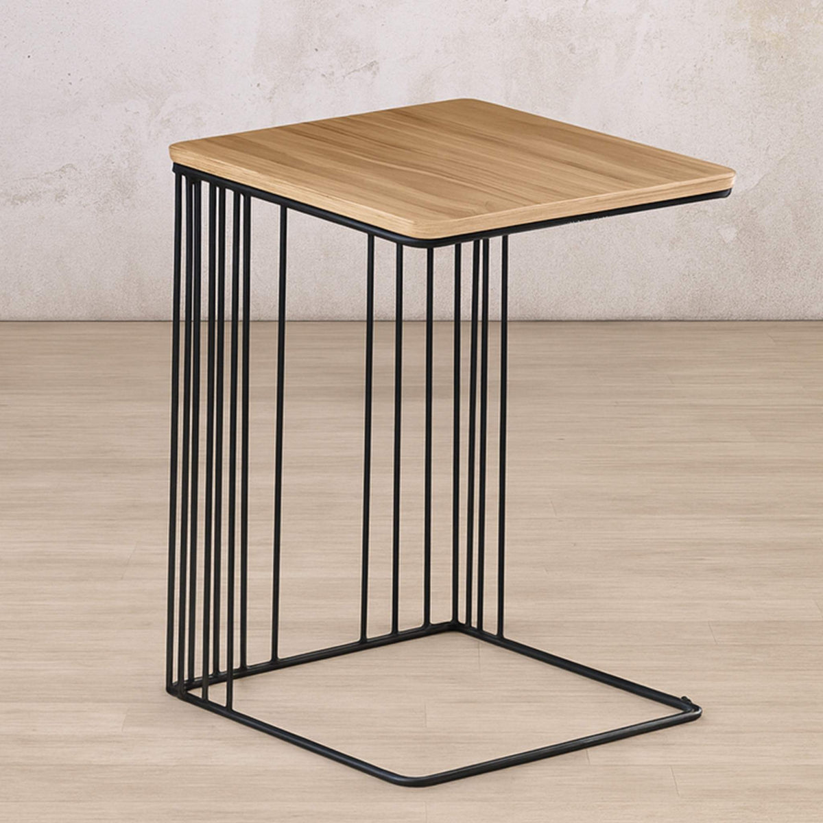 Gallery Everyday Camila Side Table in Natural, featuring a wooden top and black metal legs on a light wood floor.