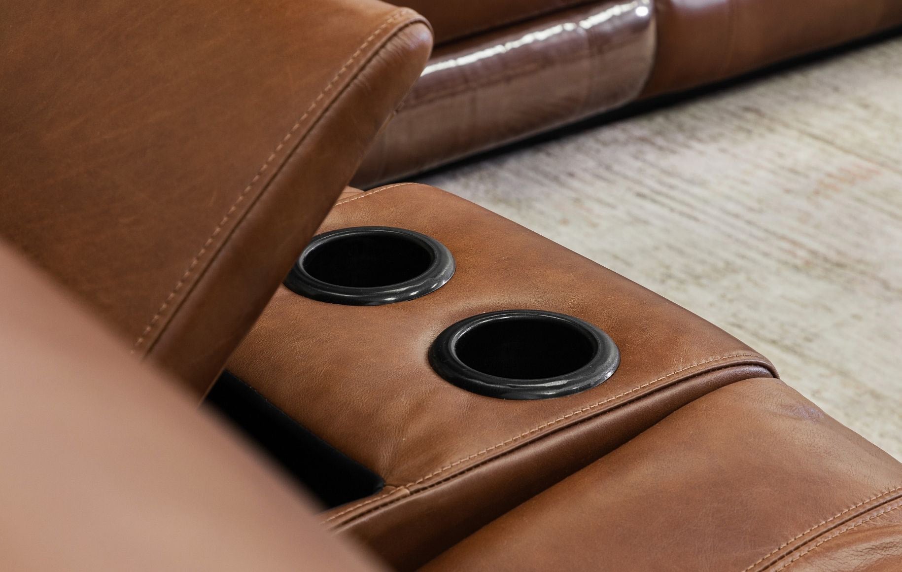 Detailed view showing two cup holders on the Geneva leather 2 seater home theatre recliner in Imperial Royal Walnut.  | home theatre recliner, recliner couches, two seater couch, couches for sale, leather recliner 