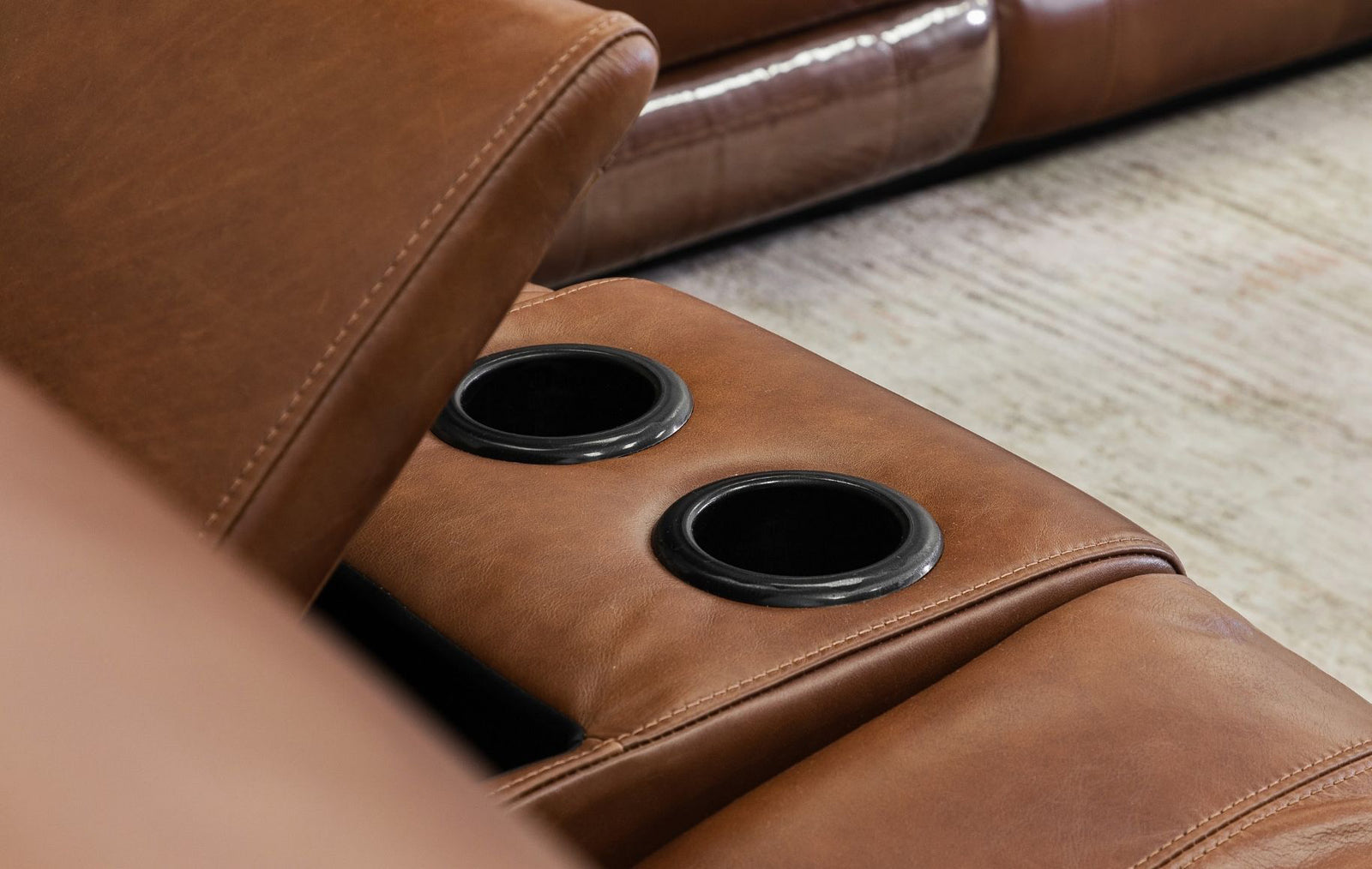 Detailed view showing two cup holders on the Geneva leather 2 seater home theatre recliner in Imperial Royal Walnut.  | home theatre recliner, recliner couches, two seater couch, couches for sale, leather recliner 