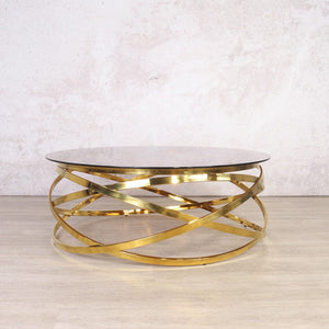 Crystal Coffee Table in Gold with a luxurious Bronze glass top and abstract base, perfect as a modern coffee table centrepiece for any living room.