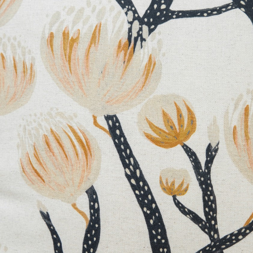 Detailed close-up of the Fynbos Protea floral design on linen-style fabric for decorative scatter cushions. | Leather Gallery Scatter Cushions