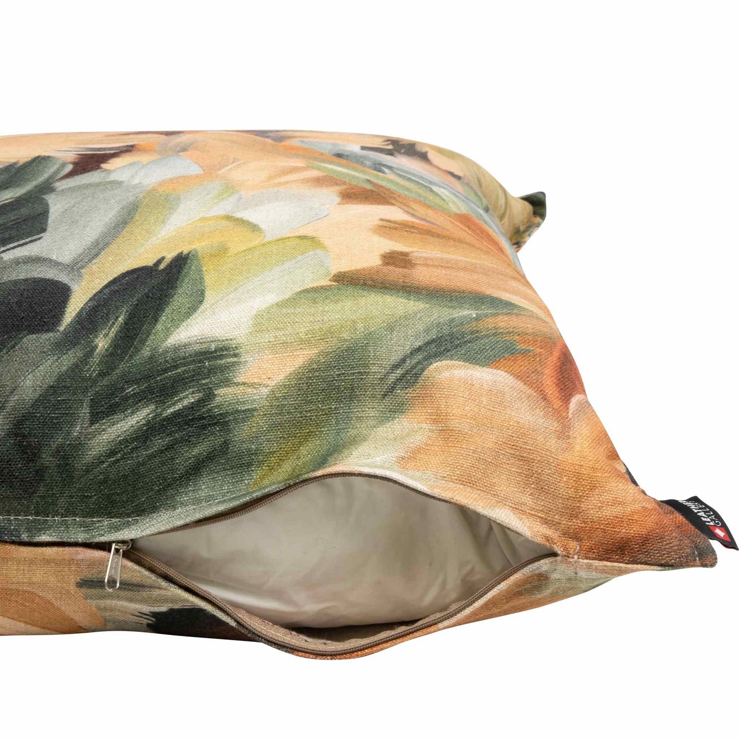 Detailed shot of an open zipper on a Majestic Sunrise cushion, revealing the plush inner padding of the scatter cushions. | Leather Gallery Scatter Cushions 