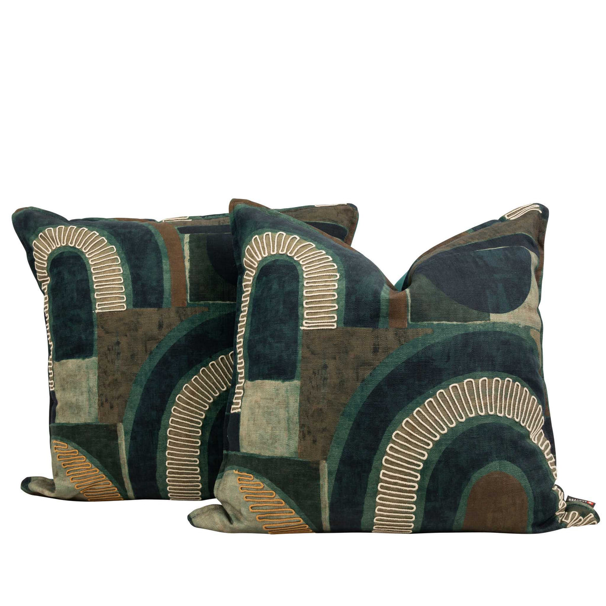 Two plush sofa cushions in Okavango Ocean teal and green abstract print, styled together to show the full pattern and luxurious volume of these scatter cushions. | Leather Gallery Scatter Cushion