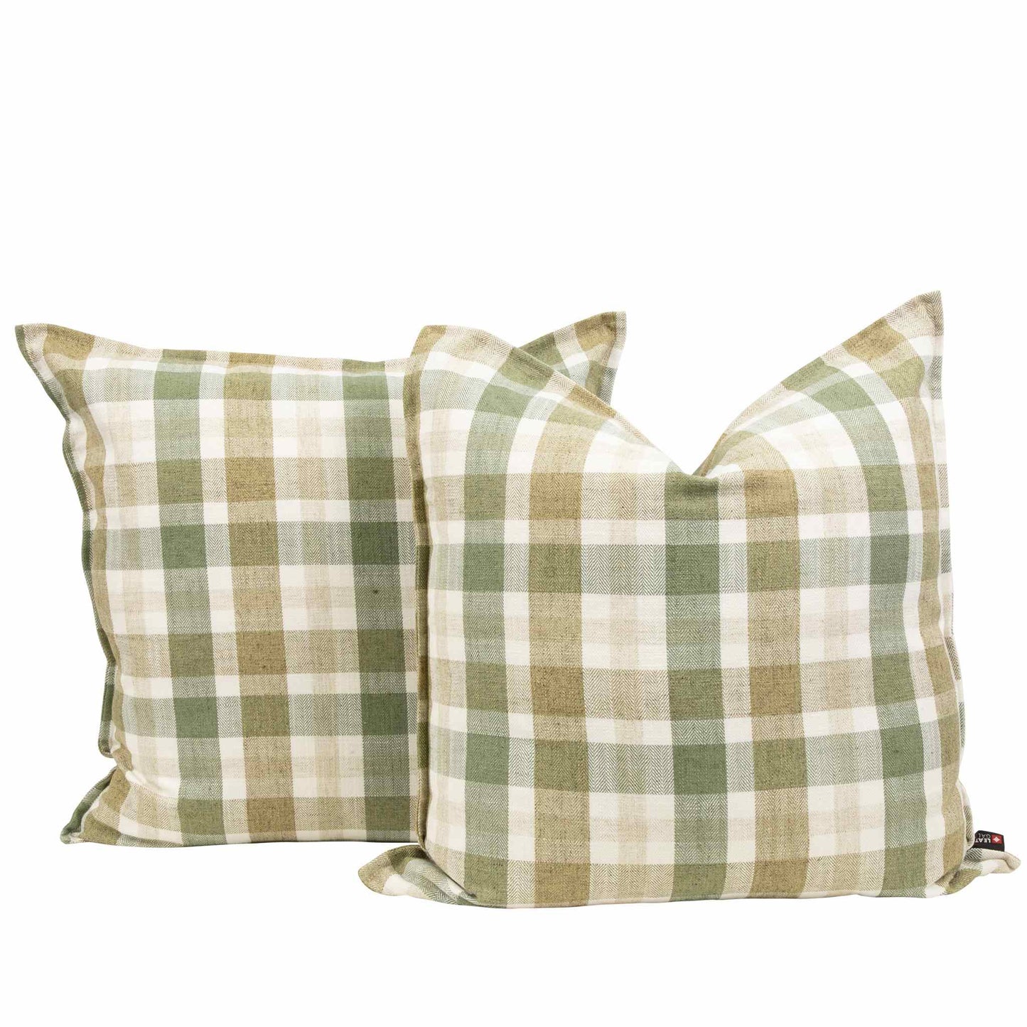 A pair of Wilderness Traveller Jade scatter cushions featuring a green and tan gingham check pattern, perfect for styling as lounge cushions or sofa cushions.- Leather Gallery Cushions