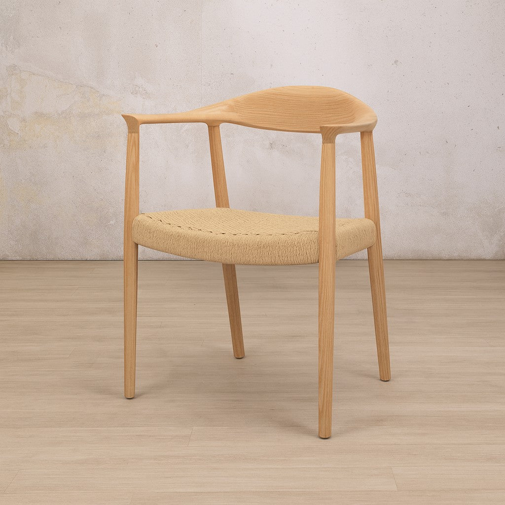 Easton wood dining chair featuring a natural ash wood frame and a textured, handwoven rope seat. dining chairs, modern dining chairs, armchairs