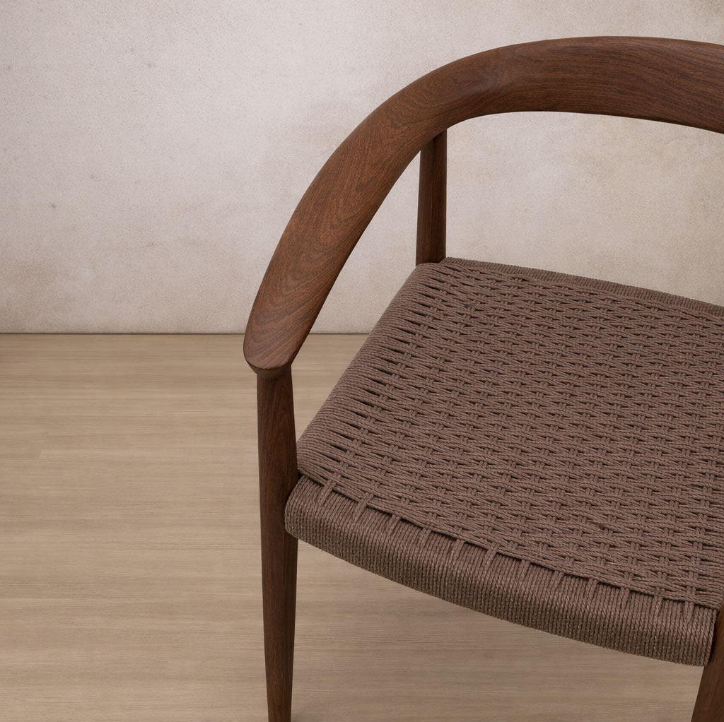 Easton wood dining chair featuring a walnut wood frame and a textured, handwoven rope seat. dining chairs, modern dining chairs, armchairs | close up