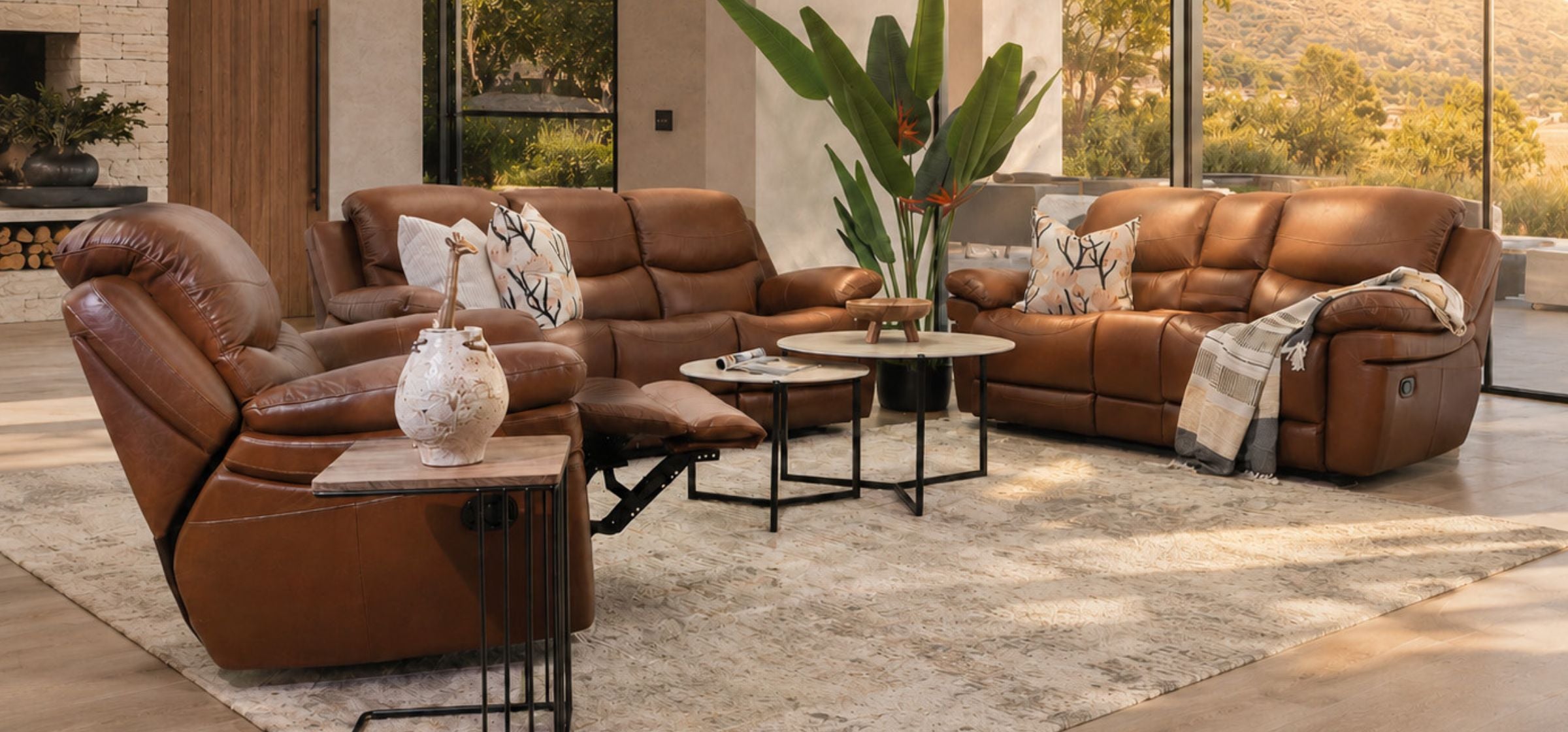 Angle view of the Geneva 3+2+1 Leather Home Theatre Recliner Lounge Suite in Imperial Royal Walnut, shown in a grand lounge space. | recliner couches, recliner chair, recliner lounge suite, couches for sale, sofas and couches 