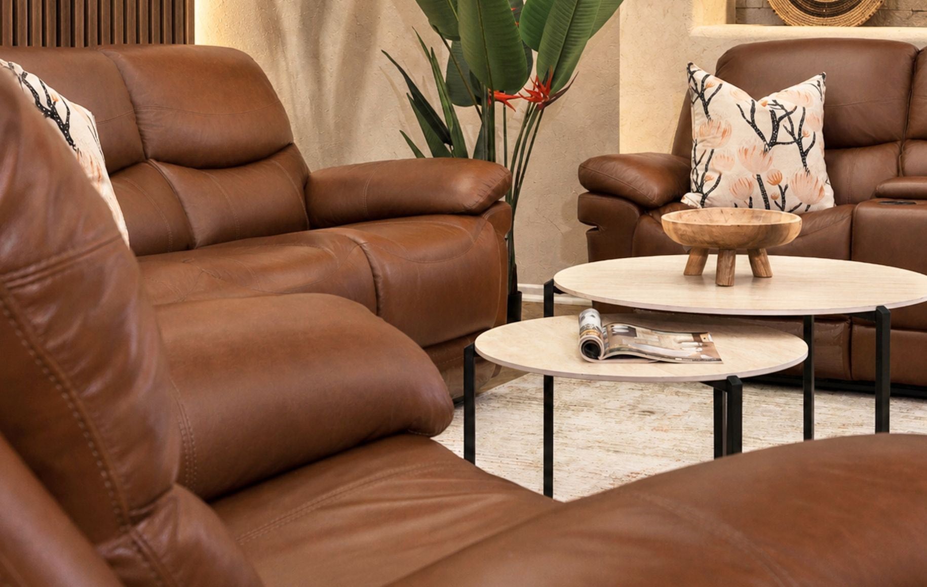Close-up of plush armrests on the Geneva leather recliners in Imperial Royal Walnut. | recliner couches, recliner lounge suite, couches for sale, brown leather couch, sofas and couches