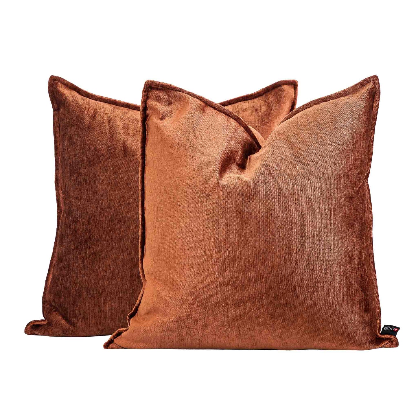 Two Leather Gallery Vista Plateau Cushions in Burnt Clay, featuring warm rust-brown velvet on a white background.