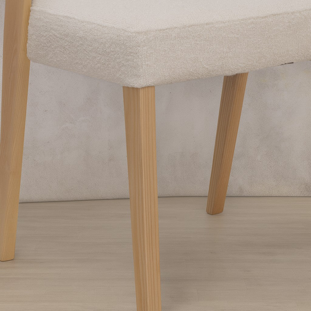 Close up of the natural toned wood legs of the Keanu Fabric Dining chair. | dining chairs, dining chairs white, modern dining chairs south africa 
