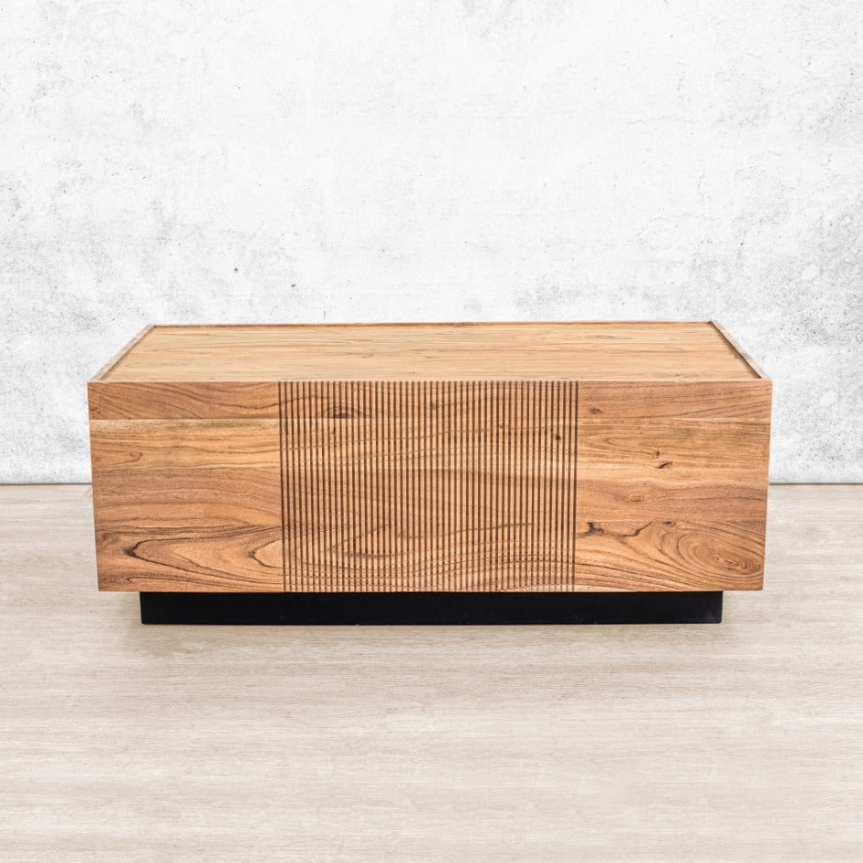 Front-on view of a contemporary rectangular Lazlo coffee table crafted from natural wood with a minimalist silhouette.