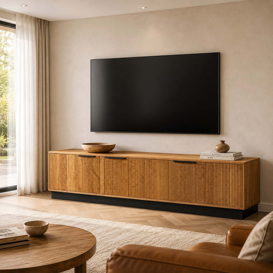 Gallery Everyday Lazlo TV Stand - 1.75m, featuring vertical slat detailing and black metal hardware beneath a wall-mounted TV.