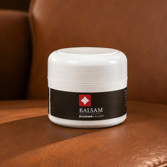 Leather Gallery Leather Balsam in a white jar, a leather care treatment formulated to condition, nourish and protect leather furniture.