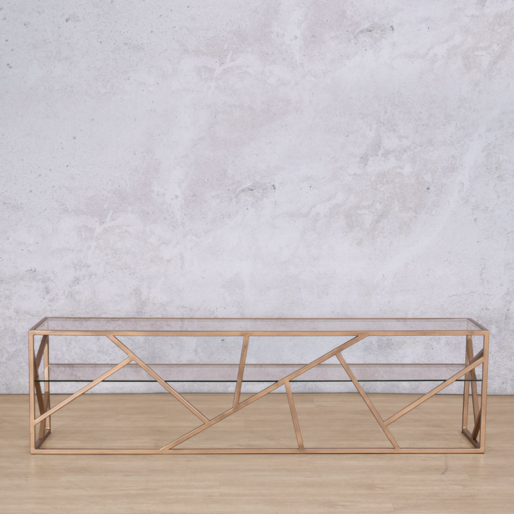 Back view of the Legacy TV Unit, featuring the sleek design and clear glass top, with visible storage space beneath