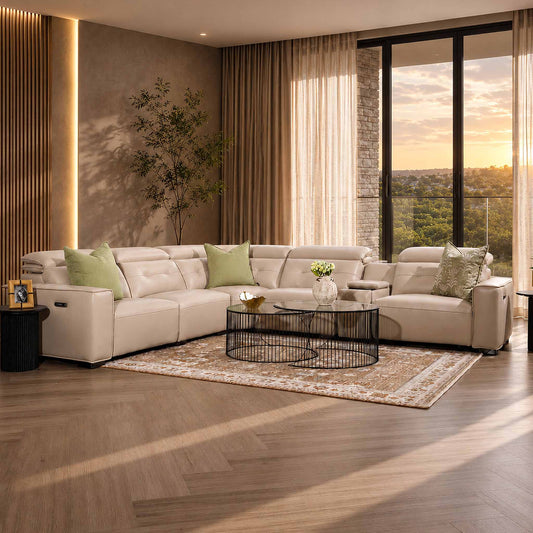 Leather Gallery Marbella 5 Seater Leather L Shape Couch in Cream Beige, styled with accent cushions in a luxurious modern living room.
