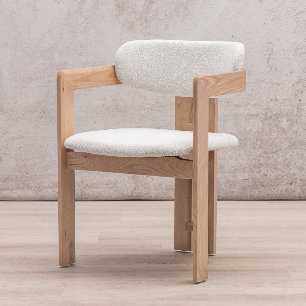 Side profile of Marlon dining chair with wood frame and curved linen seat cushion. | wood dining chair, dining chair for round table, kitchen chairs