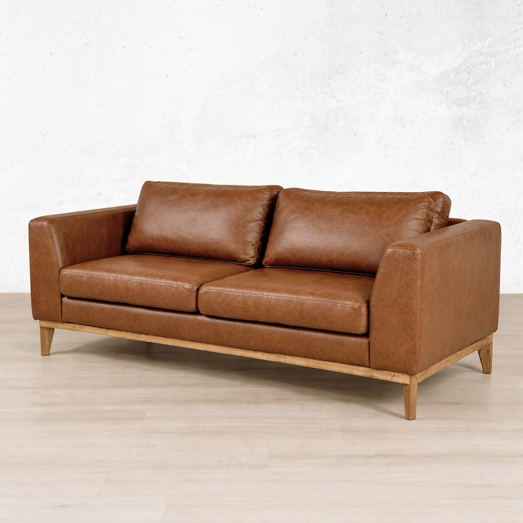 Angle view of the Modena 3-seater leather couch in czar pecan. genuine leather couches, luxury couches. 