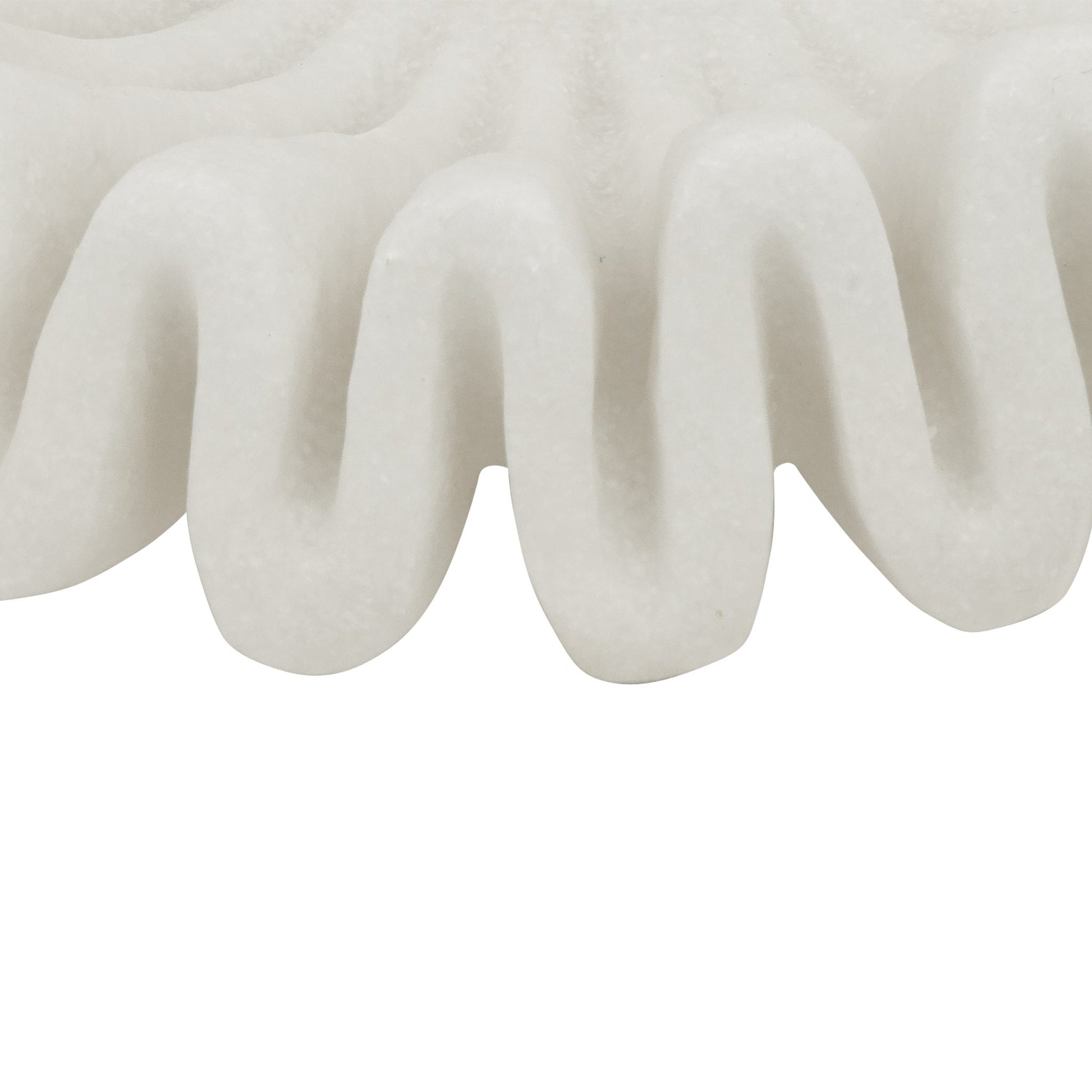 Close-up of the Leather Gallery Munich Wave Bowl, showing its textured white ribbed pattern and sculptural surface.