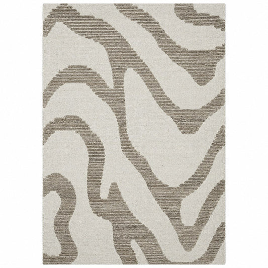 Leather Gallery Nami Rug in Stonewashed Beige, featuring a zebra-inspired taupe pattern on a warm off-white background.