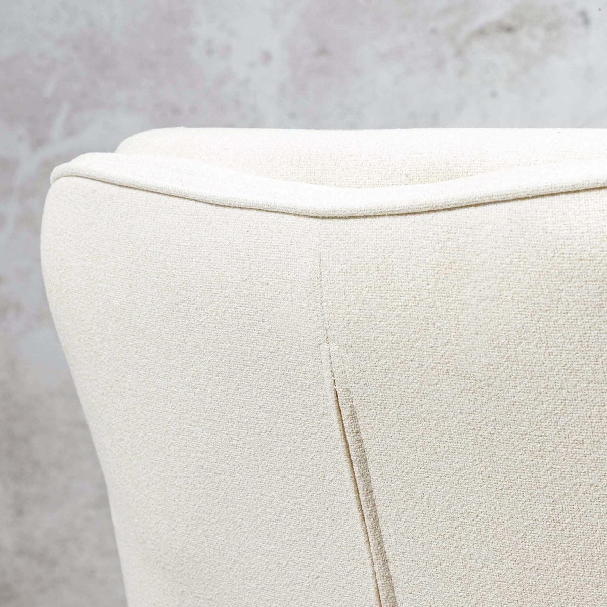 Close-up of Octavia dining chair's channel-stitched ivory linen backrest. |dining chairs, white dining chairs