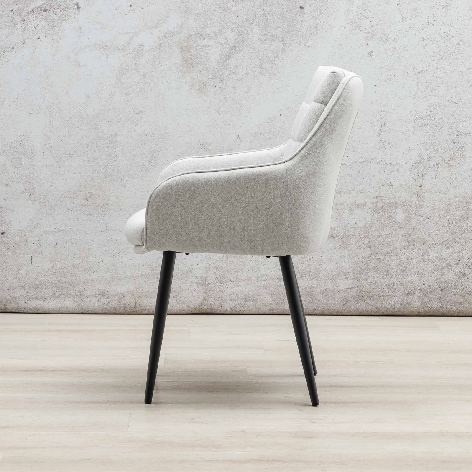 Side profile of Octavia light grey fabric dining chair showing curved armrest. |  dining chairs, dining chairs south africa