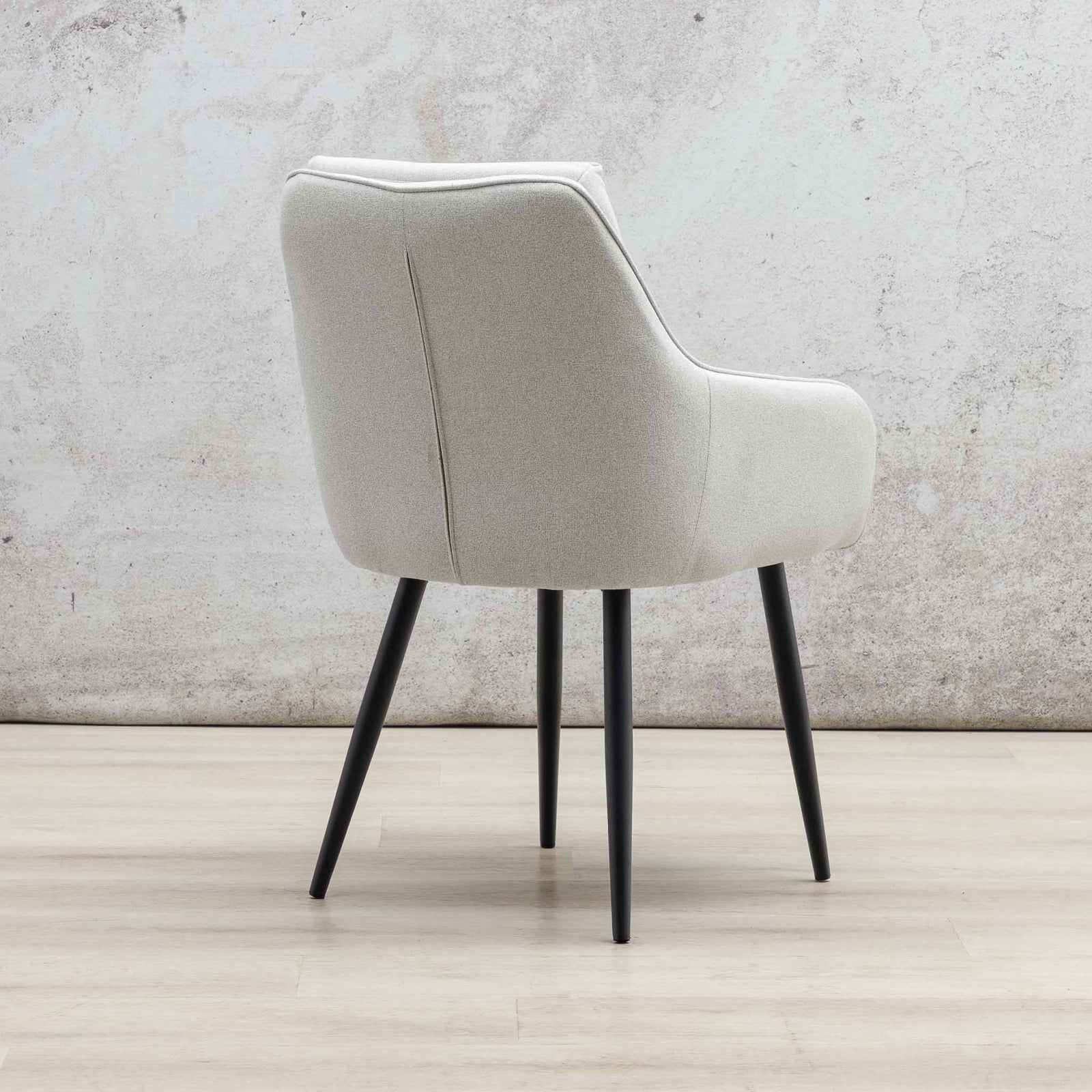Back view of Octavia light grey dining chair showing linen upholstery and tapered legs. | dining chairs, fabric dining chair