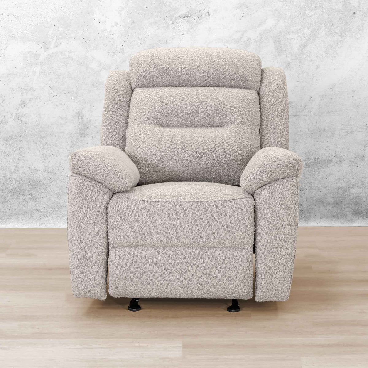 Leather Gallery Oslo 1 Seater Fabric Recliner in Stone, shown upright against a textured wall and light wood flooring.