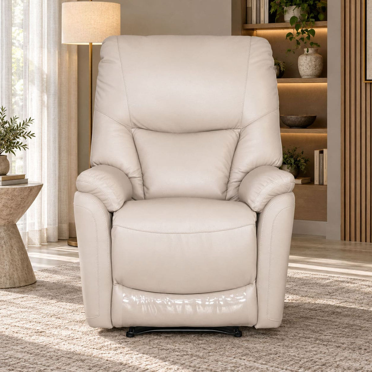 A front-facing view of the single recliner chair in Imperial Beige, showcasing its plush seating, soft leather upholstery, and elegant design.