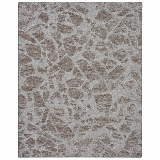 Leather Gallery Relic Rug in Cavern Grey, featuring a textured abstract organic pattern in taupe-brown and light grey tones.