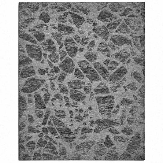 Leather Gallery Relic Rug in Cavern Grey, featuring a textured abstract organic pattern in taupe-brown and light grey tones.