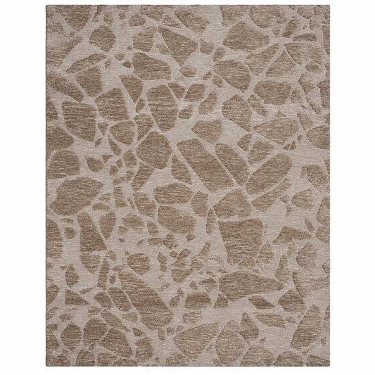 Leather Gallery Relic Rug in Desert Stone, featuring a textured abstract organic pattern in taupe, beige, and light brown tones.