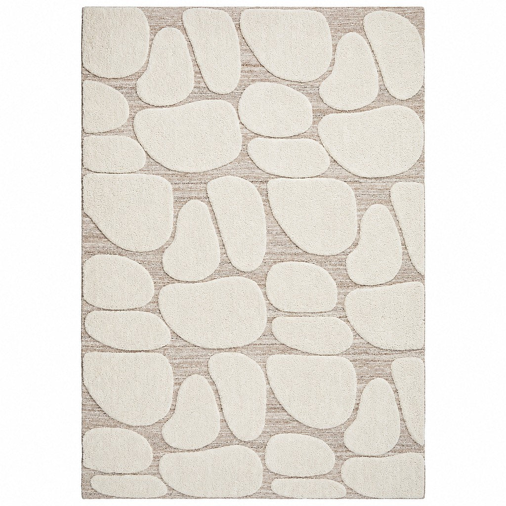 Leather Gallery Sasso Rug in Dune Cream, featuring raised organic cream shapes on a textured beige background.